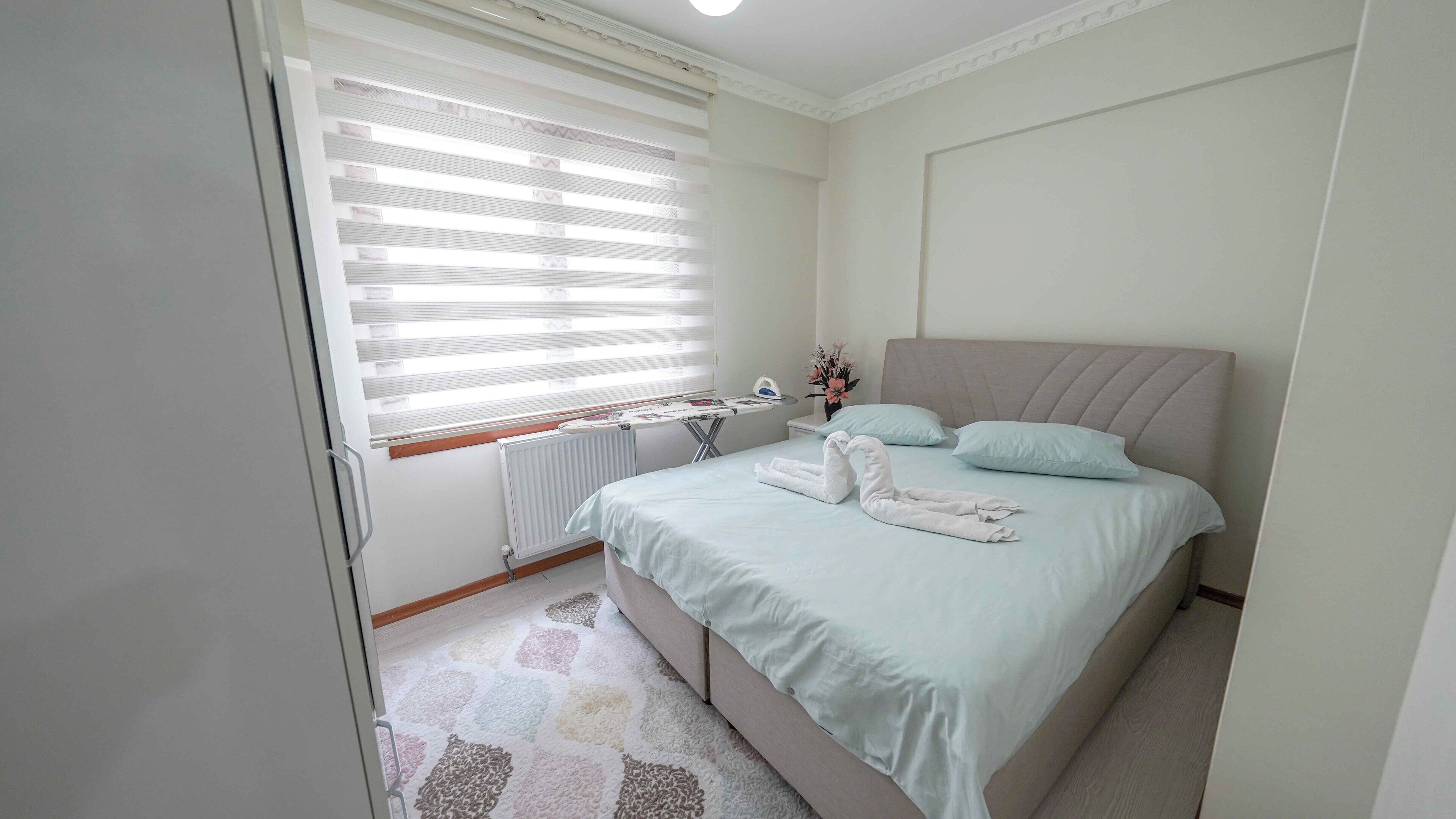 Studio | Egyptian cotton sheets, premium bedding, desk, laptop workspace