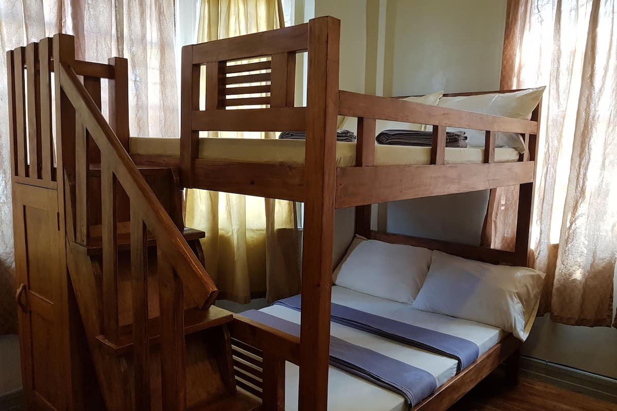 Family Room | Desk, bed sheets