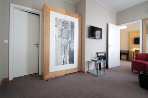 Habitación familiar | Zona de estar | Una televisión de pantalla plana