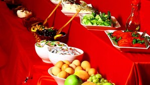 A buffet table with various food items and utensils. - Apameia Hotel (Mudanya)