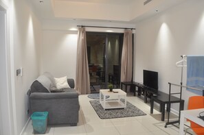 Apartment, 1 Bedroom, Balcony | Living room | Smart TV