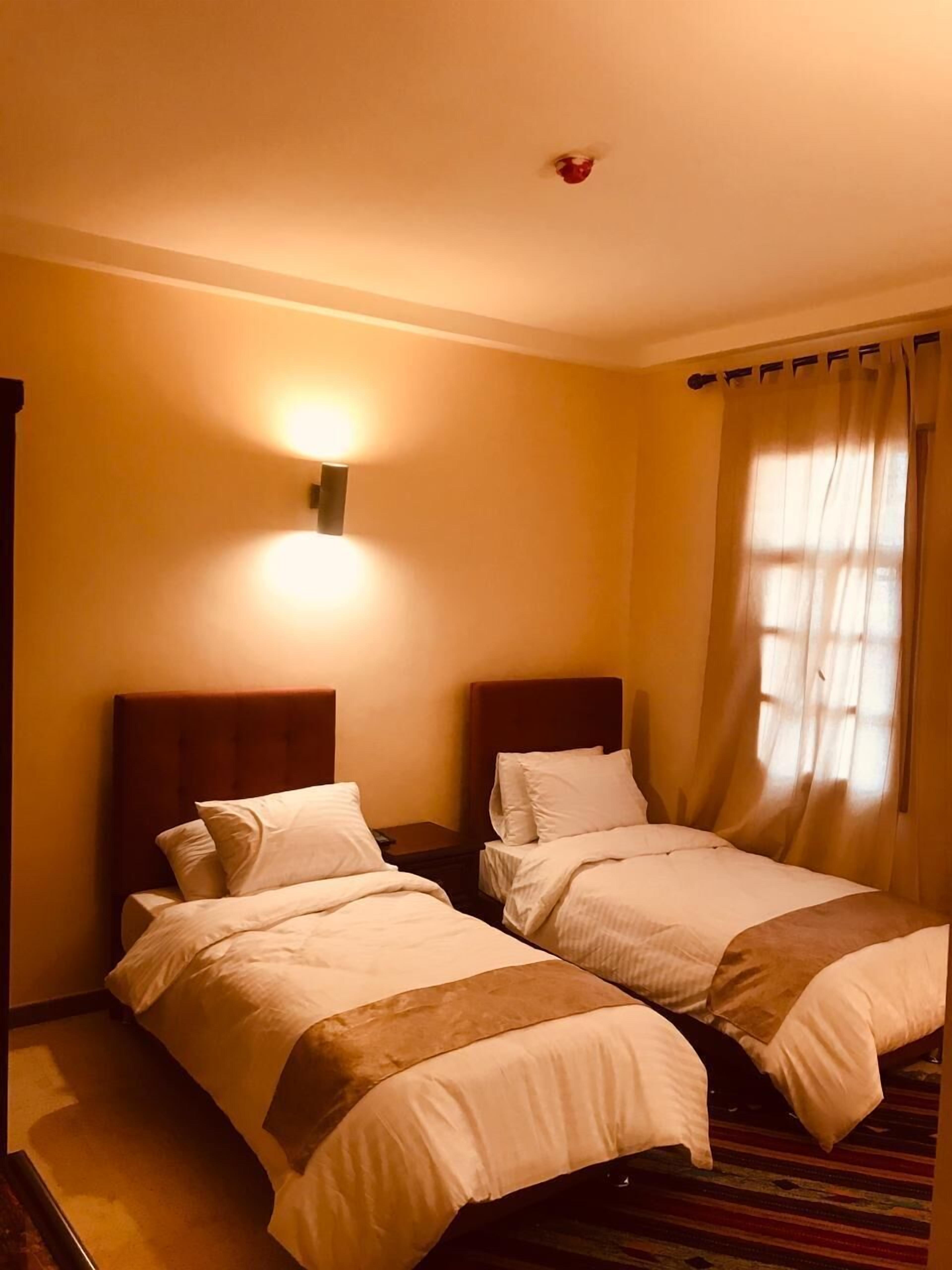 Kamar Deluks | Seprai katun Mesir, seprai premium, dan minibar