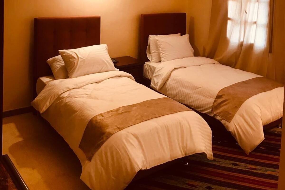 Kamar Deluks | Seprai katun Mesir, seprai premium, dan minibar