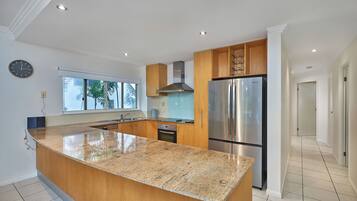 Superior Apartment, 3 Bedrooms, Ocean View | Private kitchen | Full-sized fridge, microwave, oven, stovetop