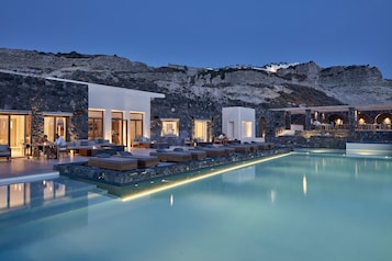 2 outdoor pools, pool umbrellas, pool loungers