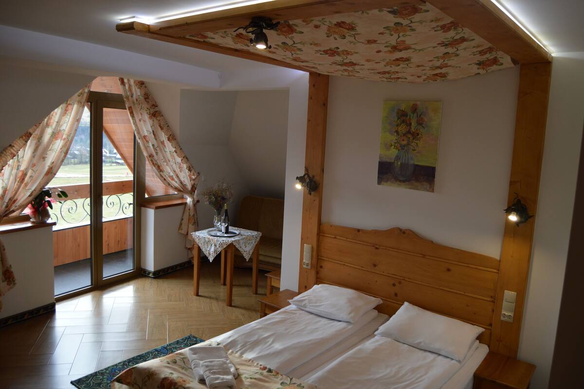 Deluxe Quadruple Room, Mountain View | Desk, iron/ironing board (on request), free WiFi, bed sheets