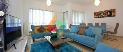 Apartment, 3 Bedrooms | Living area | LED TV