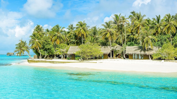 On the beach, white sand, sun-loungers, beach towels - Palm Beach Island Resort & Spa Maldives (Madhiriguraidhoo Island)