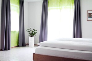 Habitación doble | Minibar, escritorio, wifi gratis y ropa de cama