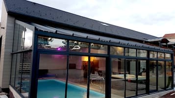 Indoor pool, open 10:00 AM to 8:00 PM, pool umbrellas, sun loungers