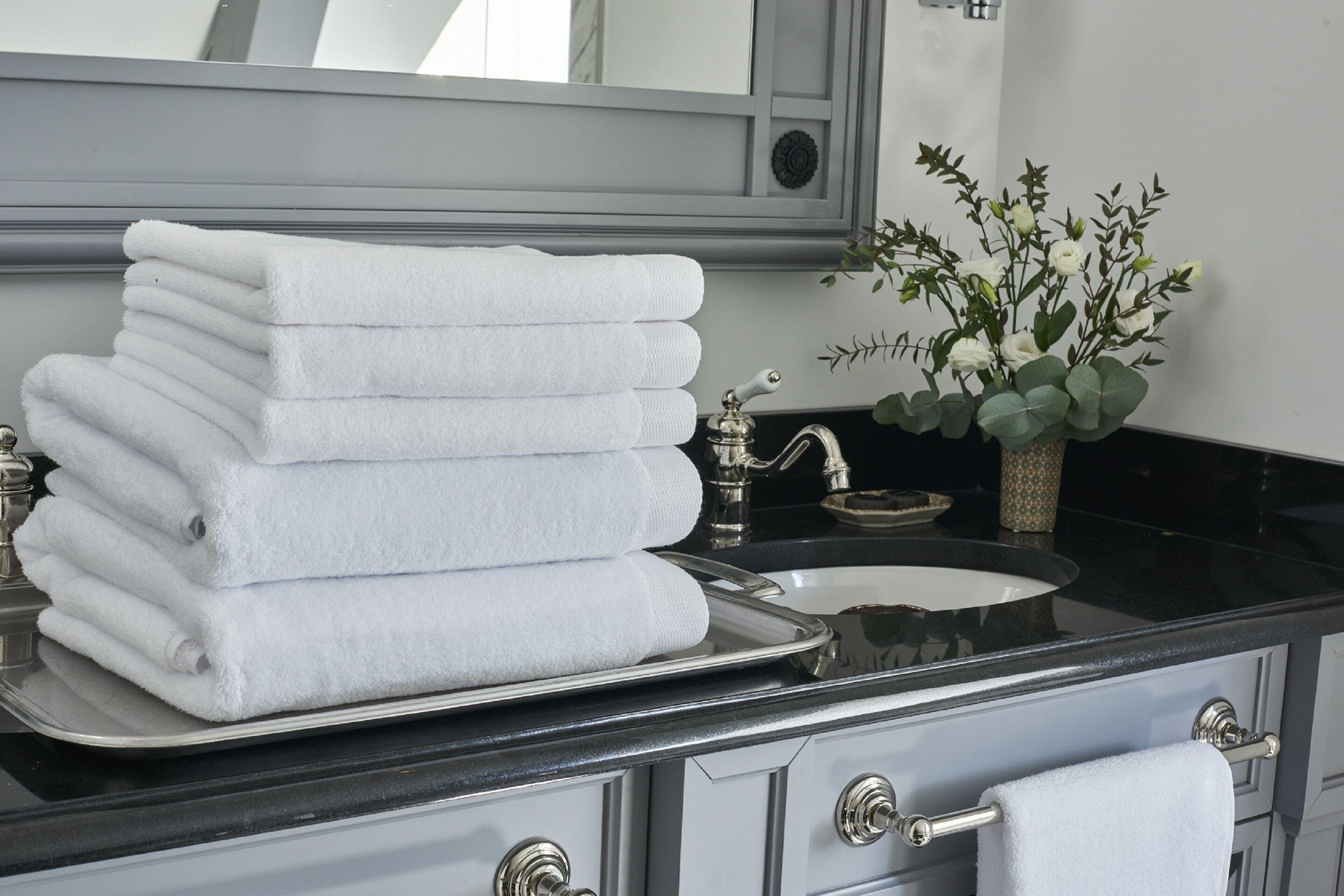 designer toiletries, hair dryer, bathrobes, slippers