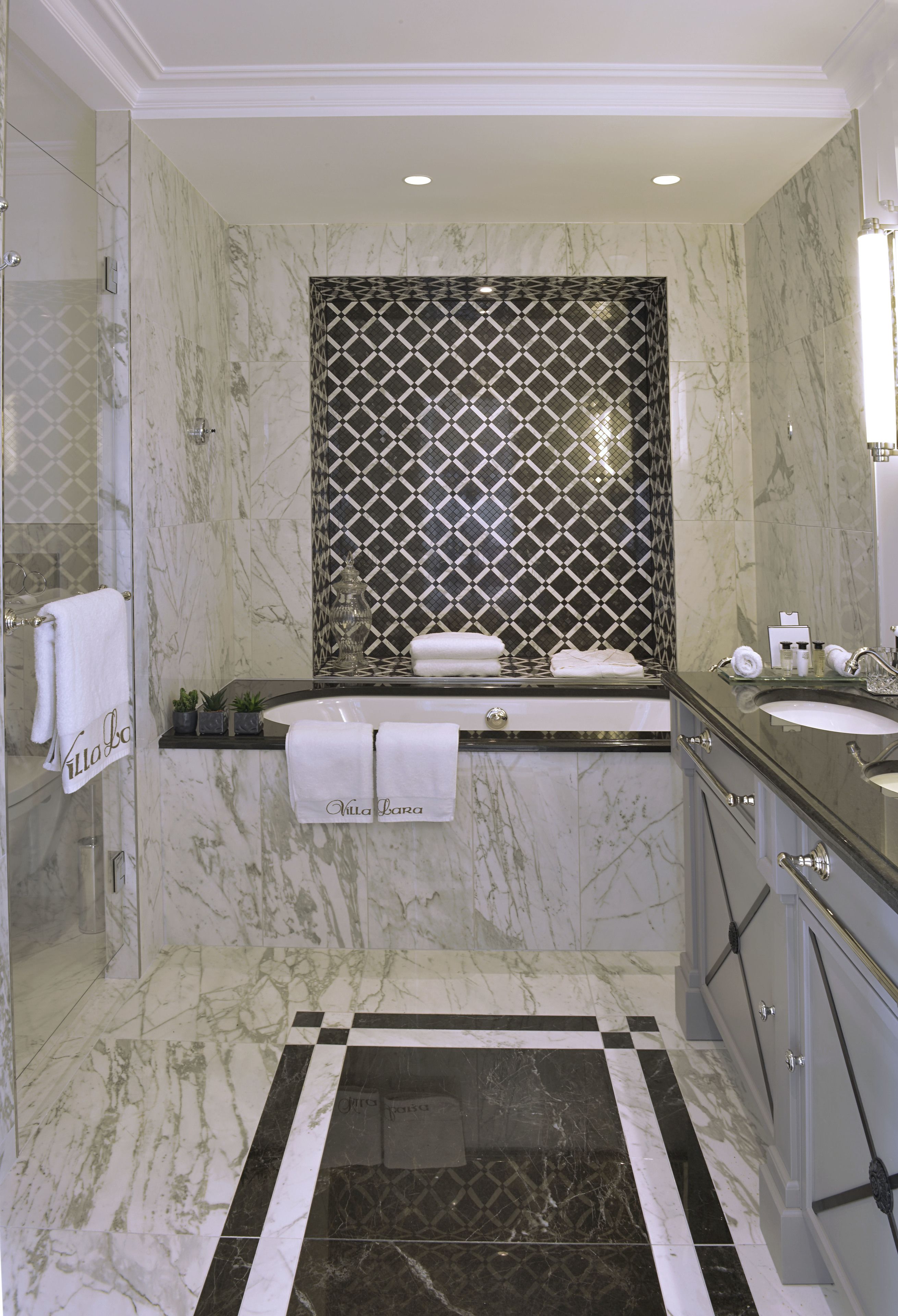 designer toiletries, hair dryer, bathrobes, slippers