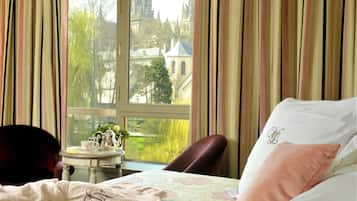 Premium bedding, free minibar, in-room safe, individually decorated