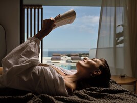 Deluxe Private Pool Suite with Sea View | Minibar, in-room safe, desk, blackout drapes