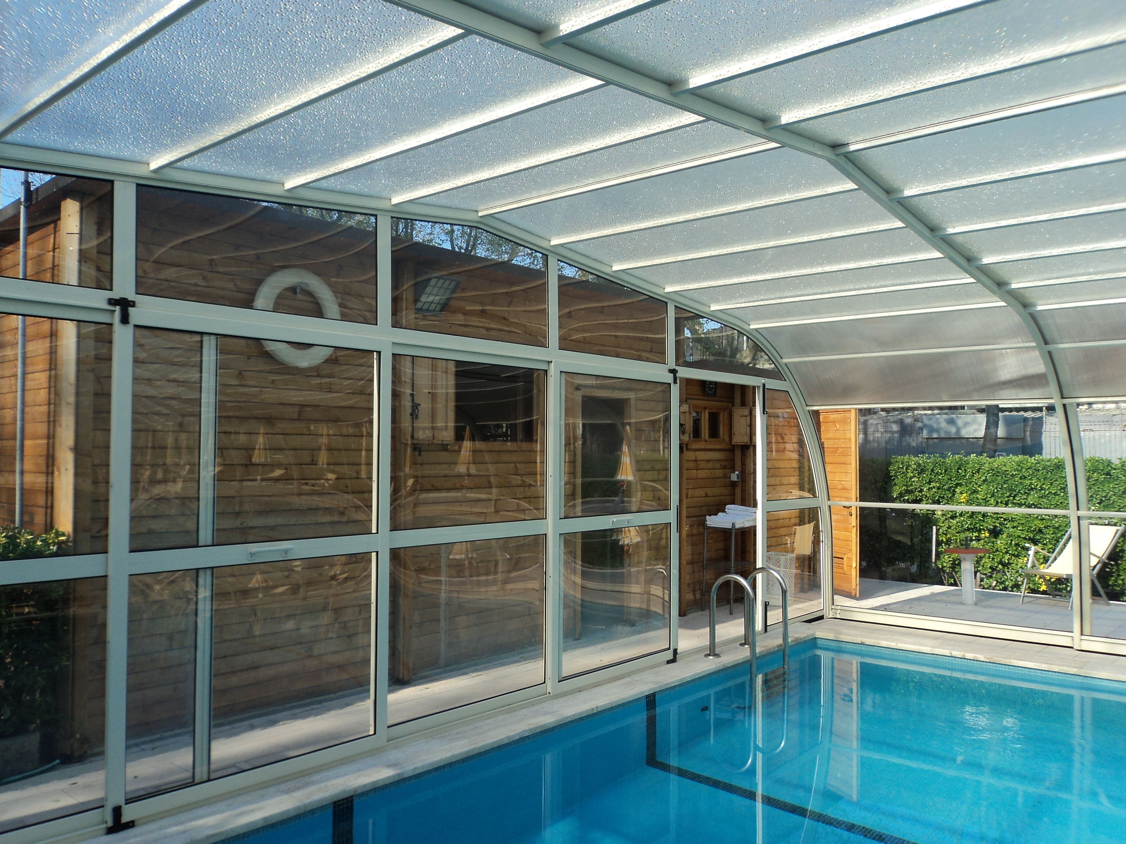 seasonal outdoor pool, open 8:30 am to 7 pm, pool umbrellas