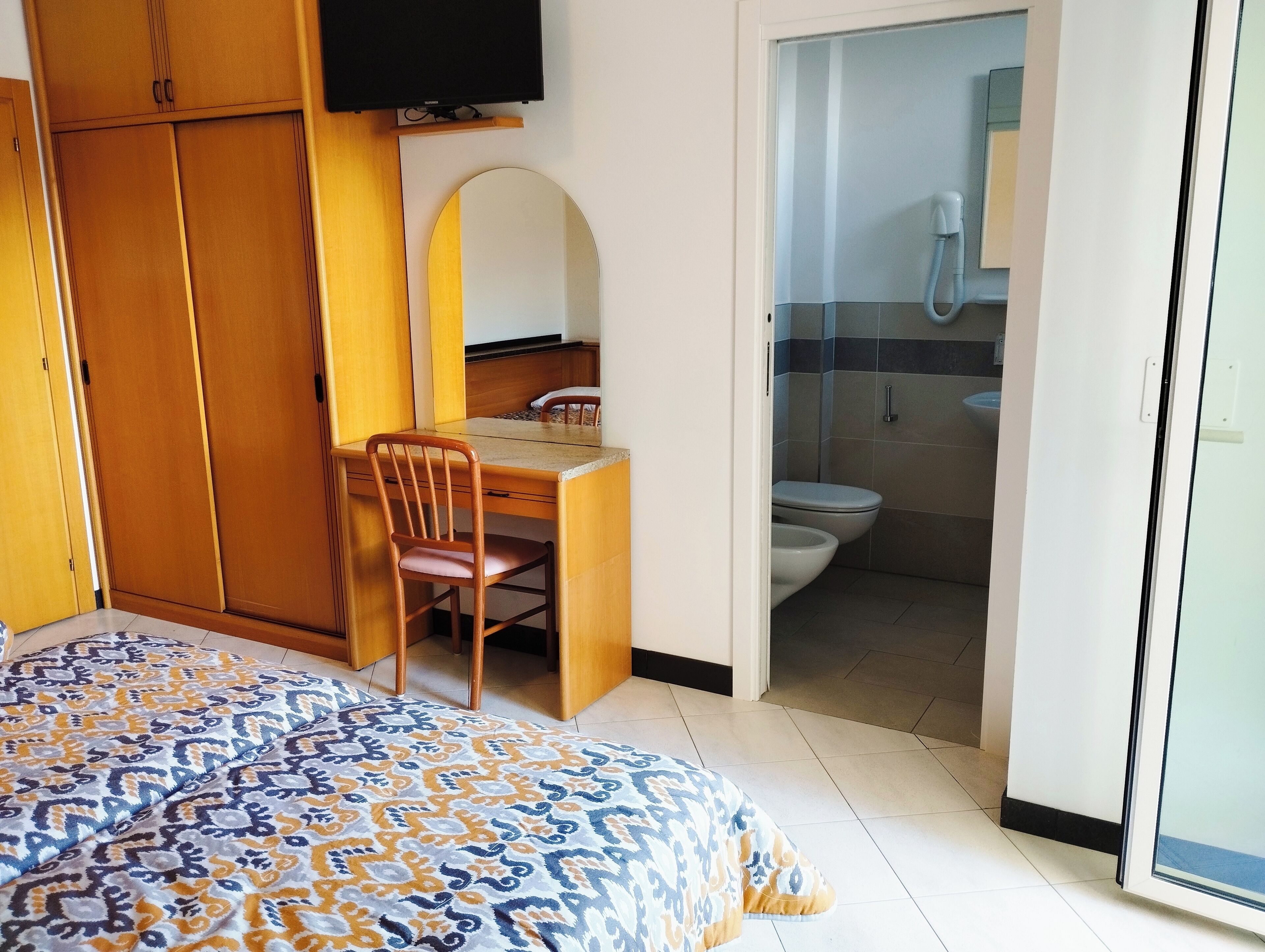 economy triple room, balcony | hypo-allergenic bedding, in-room safe, desk, free wifi