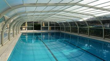 Seasonal outdoor pool, open 8:30 AM to 7 PM, pool umbrellas
