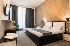 Deluxe Double or Twin Room | Minibar, in-room safe, desk, iron/ironing board