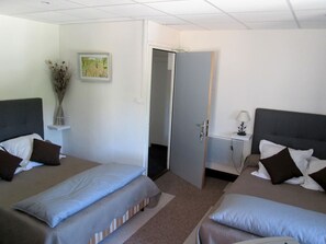 Standard Quadruple Room, Pool View | Iron/ironing board, free cribs/infant beds, free WiFi, bed sheets