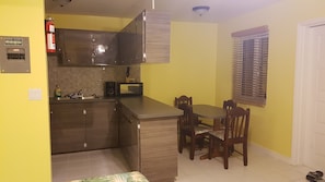 Economy-Apartment, 1 Schlafzimmer | Wohnbereich | Flachbildfernseher