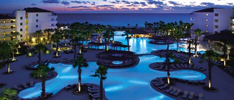 2 outdoor pools, pool umbrellas, pool loungers