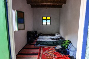 Habitación cuádruple | Cortinas opacas