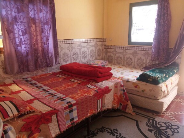 Blackout curtains, rollaway beds