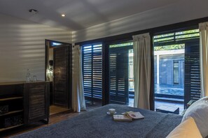 Comfort Room, Private Bathroom, Partial Ocean View | Minibar, in-room safe, iron/ironing board, free WiFi - 99 Surf Lodge (Tola)