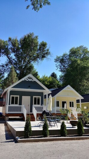 Stroll out to the inviting porch area, complete with a table and chairs.