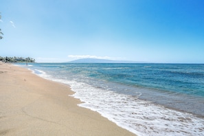 On the beach, sun-loungers, beach towels