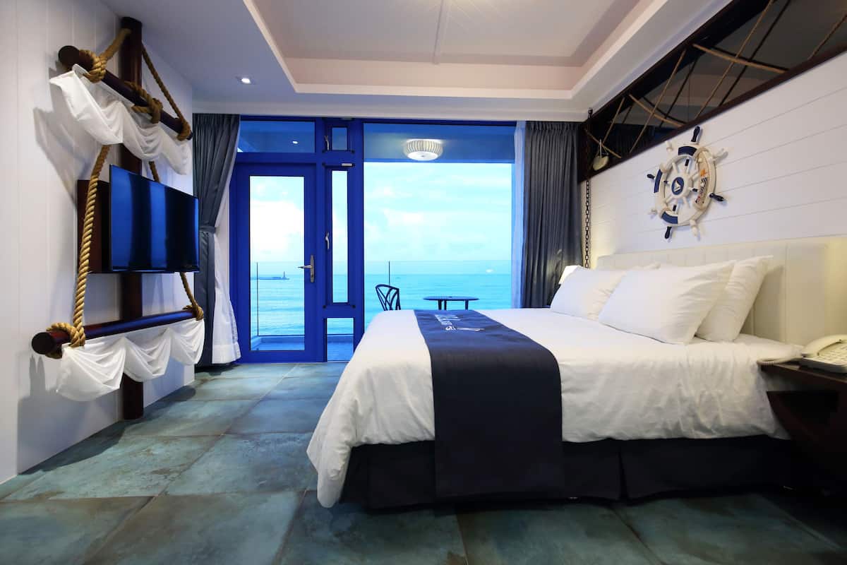 Kamar Double Deluks, pemandangan laut | Meja kerja, tirai kedap cahaya, kedap suara, dan Wi-Fi gratis