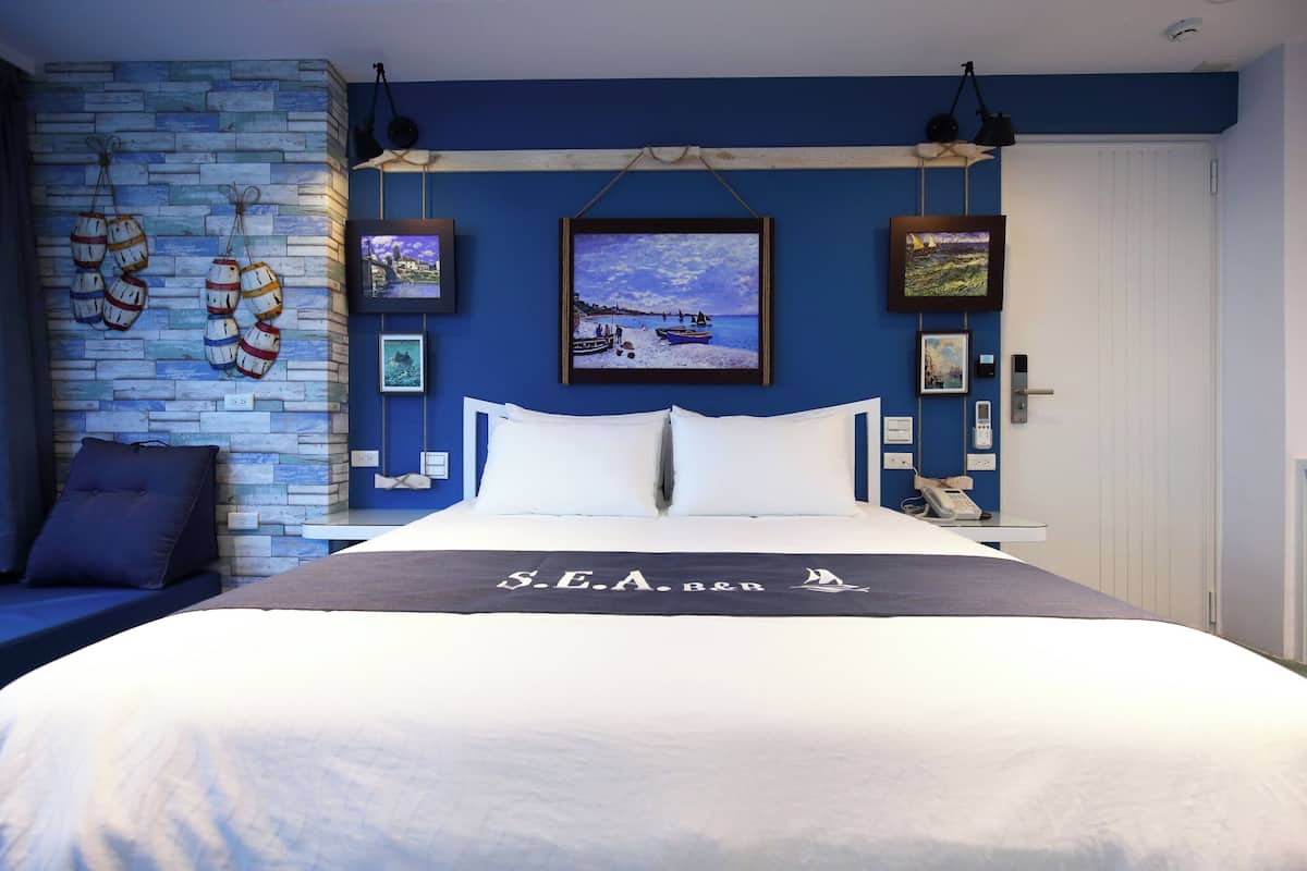 Kamar Double Deluks, pemandangan laut | Meja kerja, tirai kedap cahaya, kedap suara, dan Wi-Fi gratis