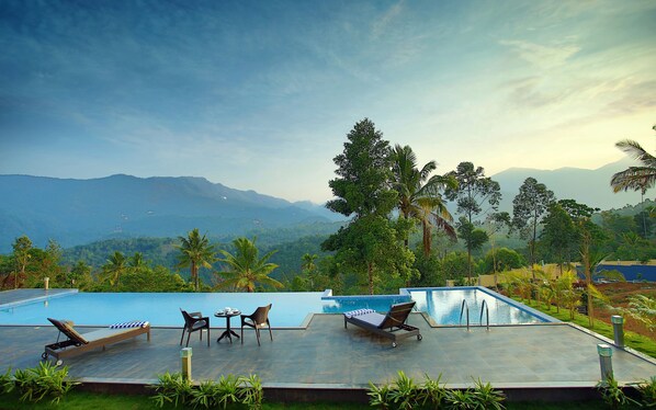 Outdoor pool, open 7:00 AM to 7:00 PM, pool umbrellas, pool loungers - The Leaf Munnar Resort (Devikolam)