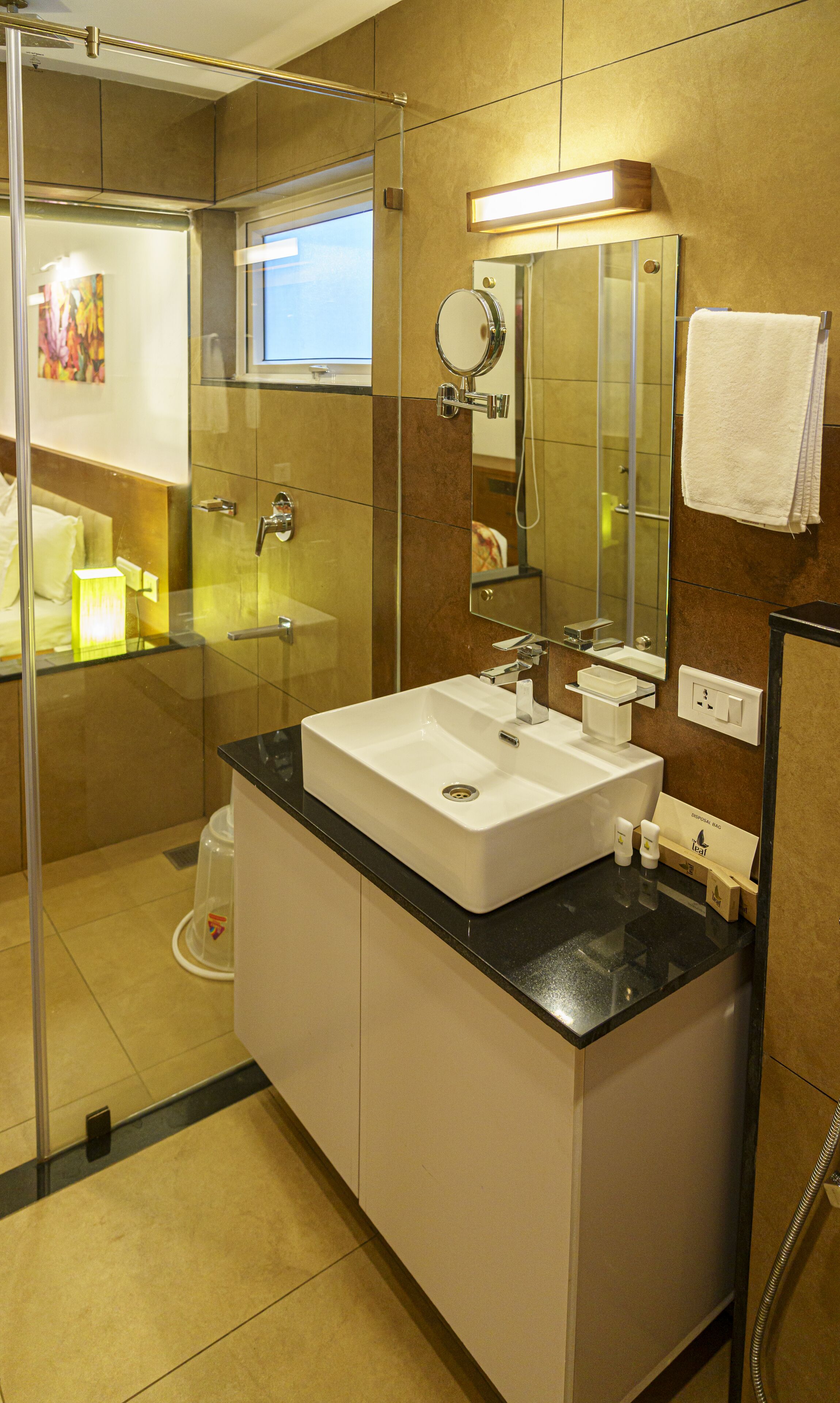 shower, free toiletries, hair dryer, towels