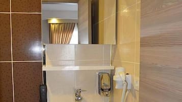 Shower, free toiletries, hair dryer, slippers