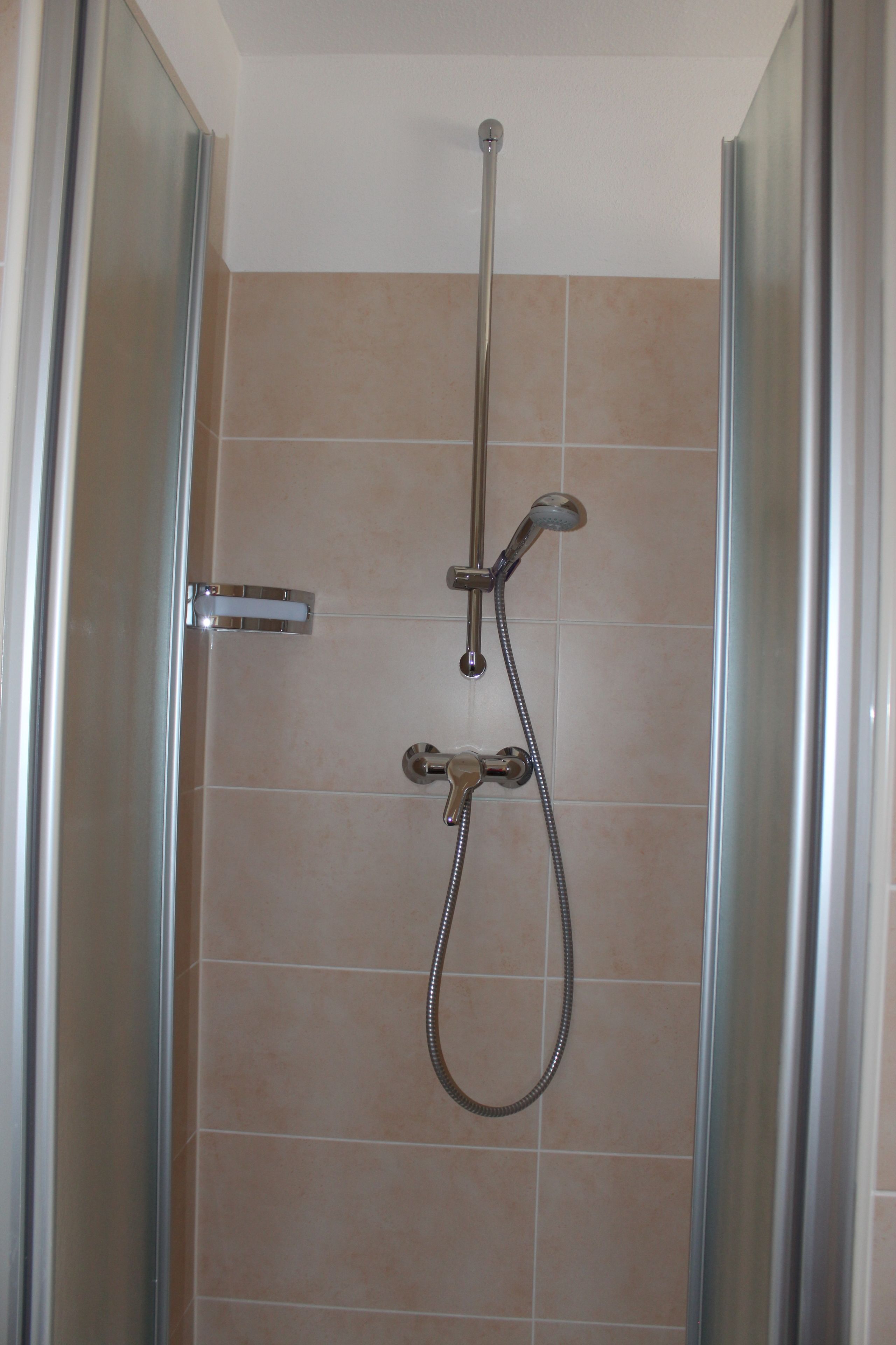 deluxe apartment, 2 bedrooms, balcony, park view | bathroom shower