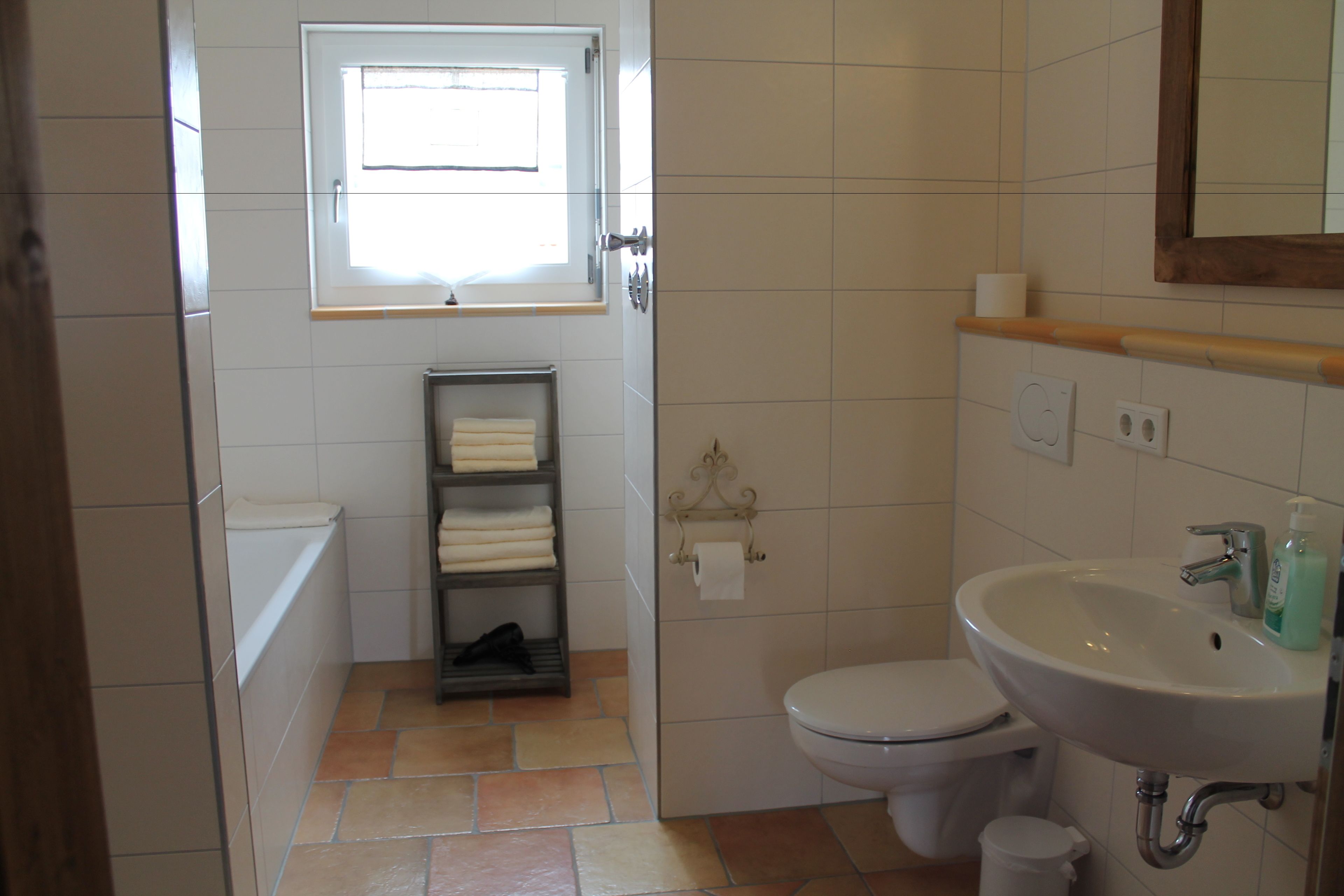 deluxe apartment, 1 bedroom, balcony, park view | bathroom | hair dryer, towels