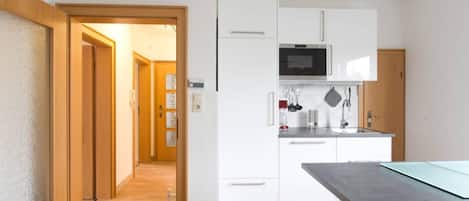 Departamento urbano, 2 habitaciones, para no fumadores | Cocina privada | Refrigerador con congelador, microondas y parrilla de estufa