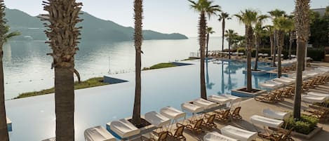 Indoor pool, 2 outdoor pools, sun loungers, lifeguards on site