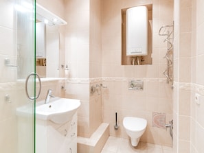 Apartment, 1 Bedroom | Bathroom | Shower, hair dryer, slippers, towels - Design Apartment Budapeshtskaya 7 (St. Petersburg)