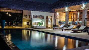 Outdoor pool, open 7:00 AM to 9:00 PM, free pool cabanas, pool loungers