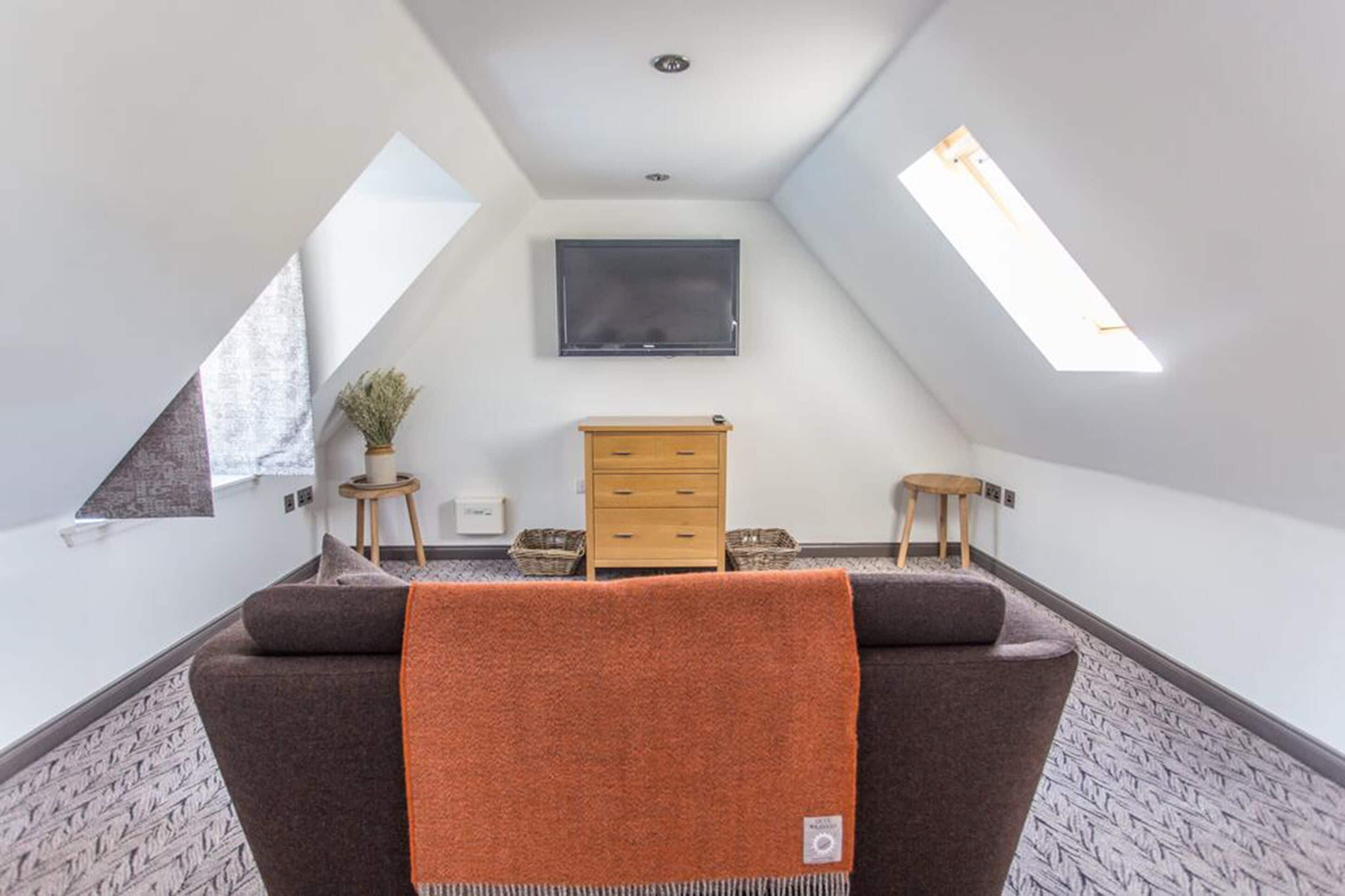 The Cottage | Wohnbereich | Fernseher