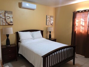 Comfort Single Room, 1 Queen Bed, Accessible, Refrigerator | Premium bedding, individually decorated, blackout drapes, free WiFi - Sunset Ridge Hotel (Providenciales)