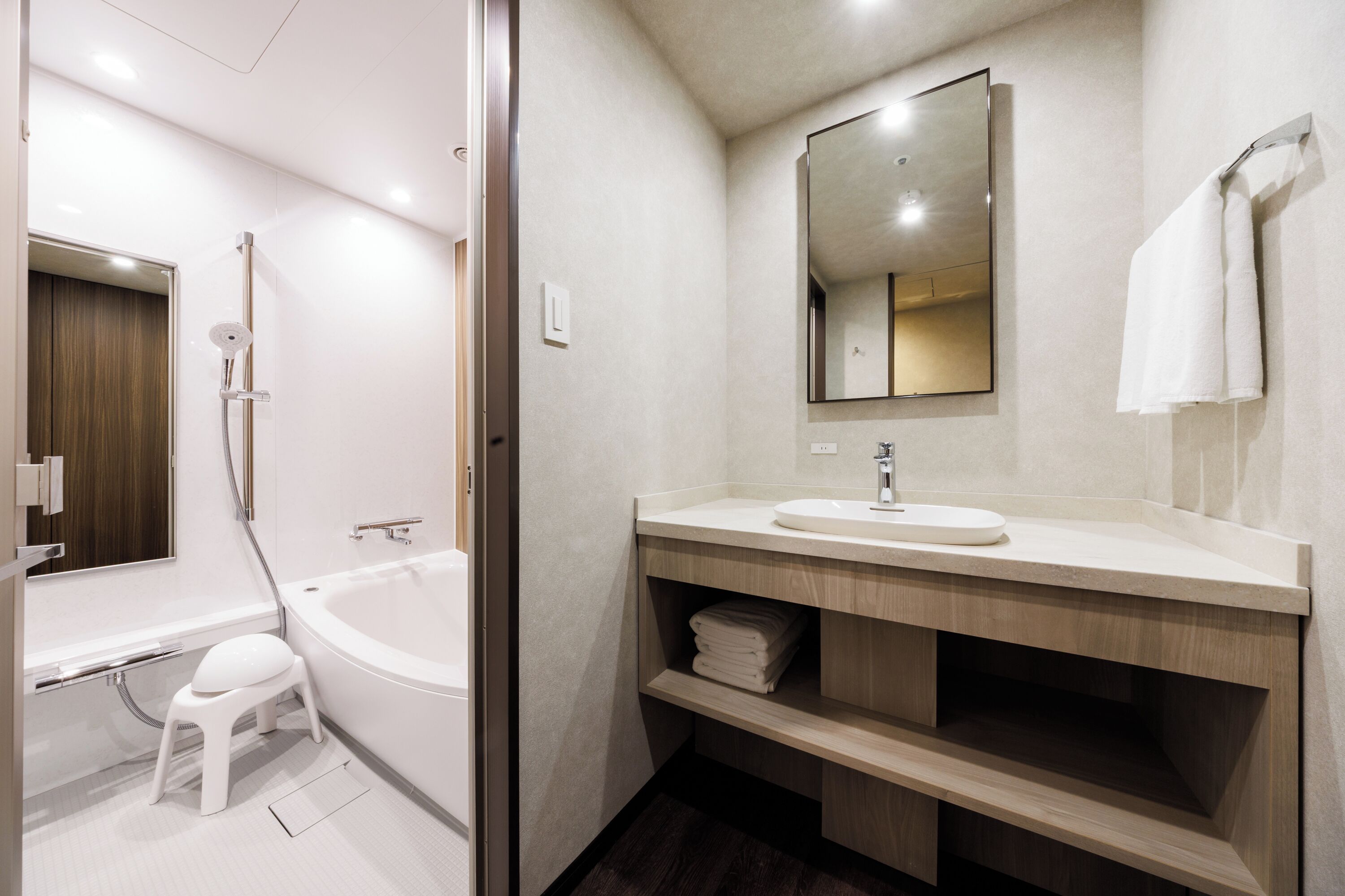 hair dryer, slippers, electronic bidet, towels