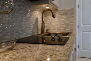 Comfort Bungalow, 1 King Bed, Non Smoking, Beach View | Private kitchen | Coffee/tea maker, cookware/dishes/utensils - Fountain Bay Resort & Marina (New Bight)