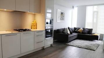 Condo, 2 Bedrooms, Kitchen | Living room | Flat-screen TV