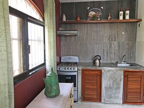 Fridge, microwave, stovetop, coffee/tea maker