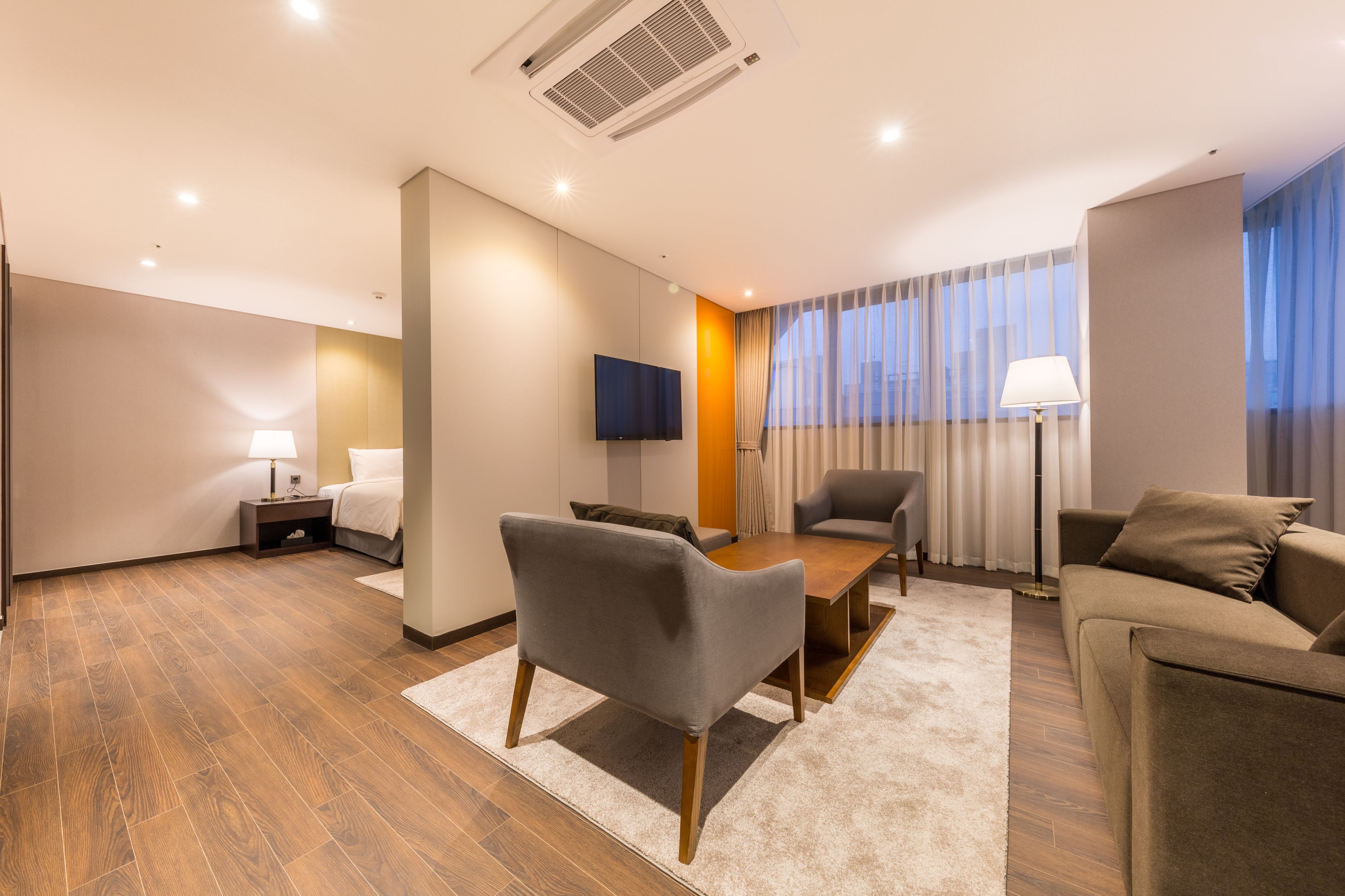 suite, 1 king bed, non smoking | living area | flat-screen tv, pay films