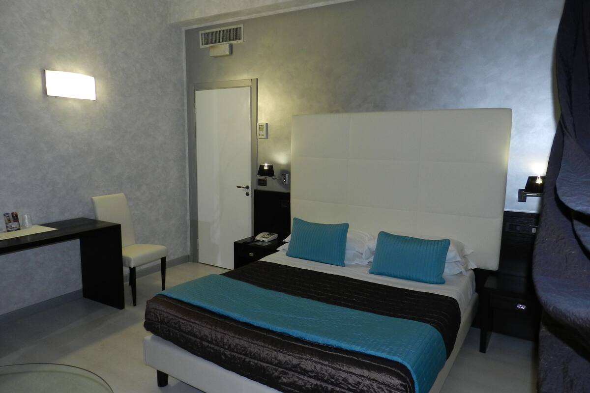deluxe double room | in-room safe, desk, blackout curtains, soundproofing