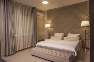 Deluxe Room, 1 Bedroom (Double) | In-room safe, desk, iron/ironing board, free WiFi